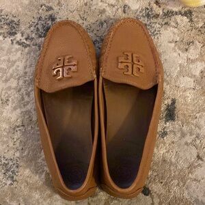 Tory Burch tan loafers.
